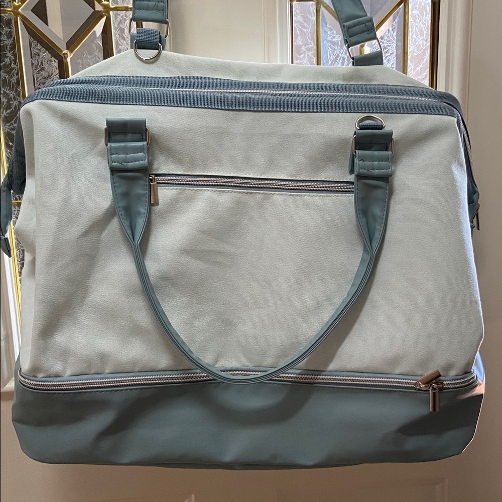 DSW Elegant Blue and Cream Travel Bag